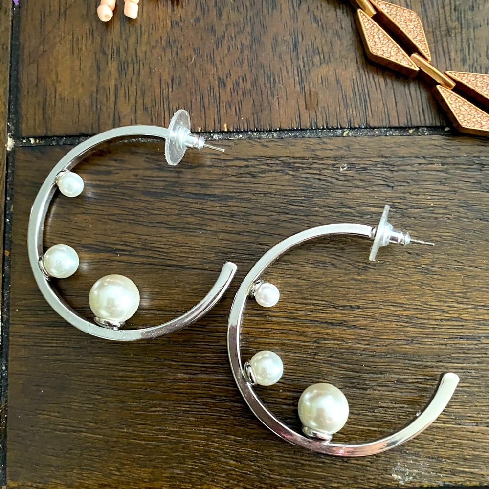Silver hoops with accents